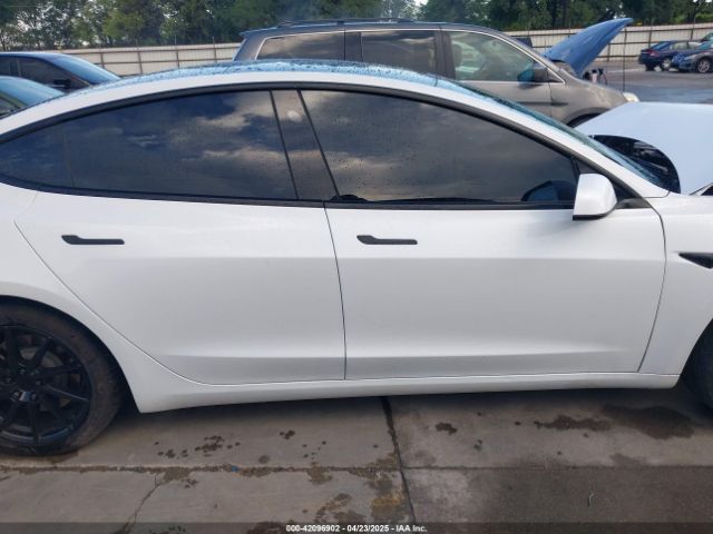 5YJ3E1EA3MF874212 Tesla 2021