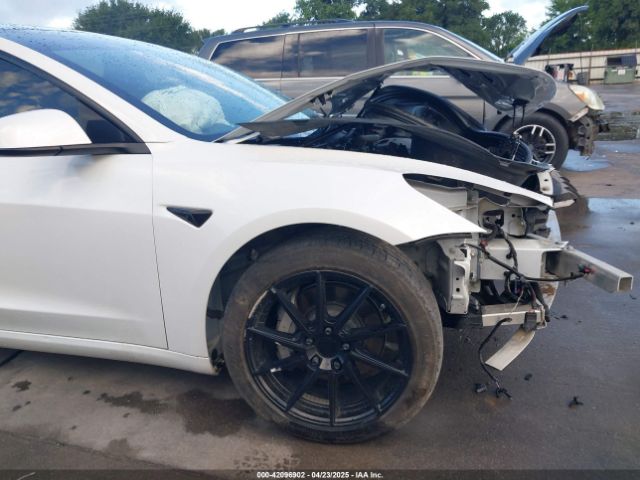 5YJ3E1EA3MF874212 Tesla 2021