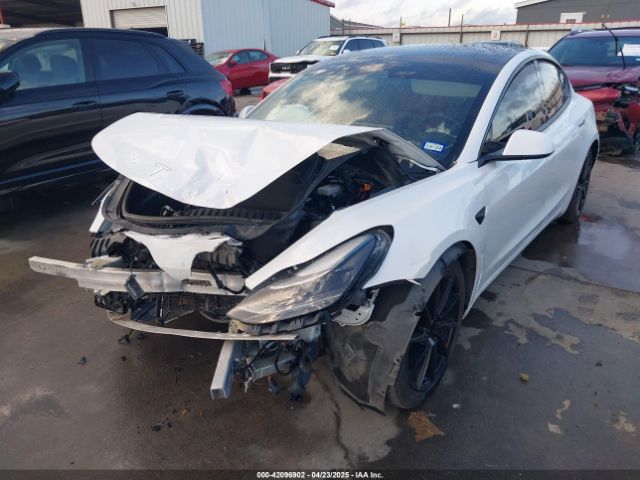 5YJ3E1EA3MF874212 Tesla 2021