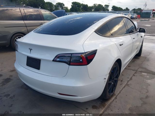 5YJ3E1EA3MF874212 Tesla 2021