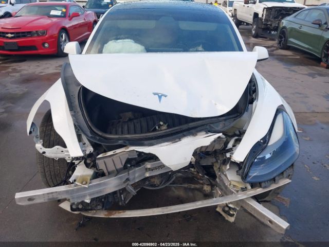 5YJ3E1EA3MF874212 Tesla 2021