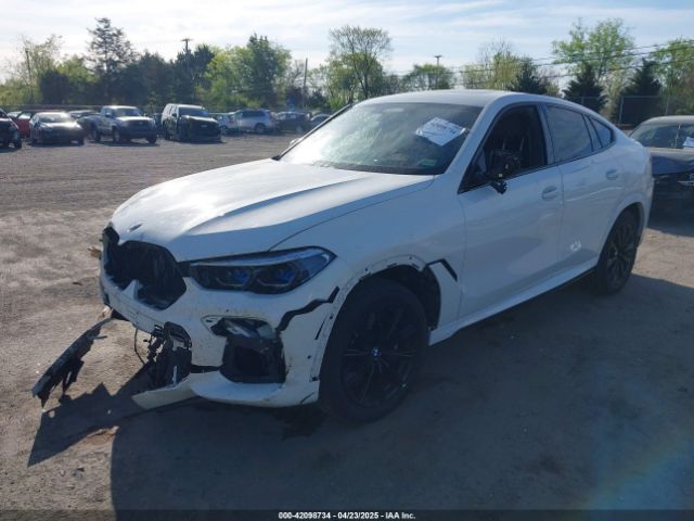 2021 BMW X6 5UXCY8C07M9E09762 Photo 1