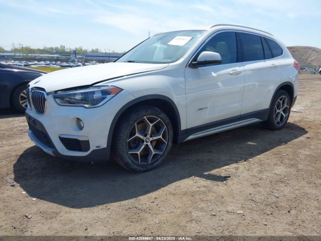 2018 BMW X1 WBXHT3C39J5F91912 Photo 1