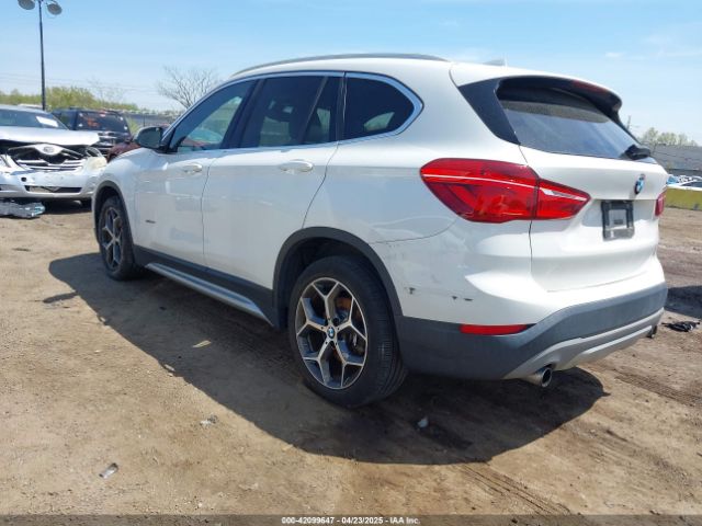 2018 BMW X1 WBXHT3C39J5F91912 Photo 2