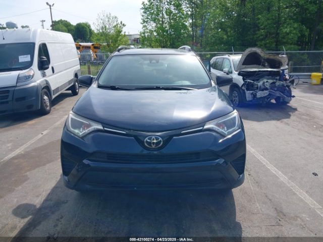 JTMZFREV4JJ208053 Toyota RAV4 LE
