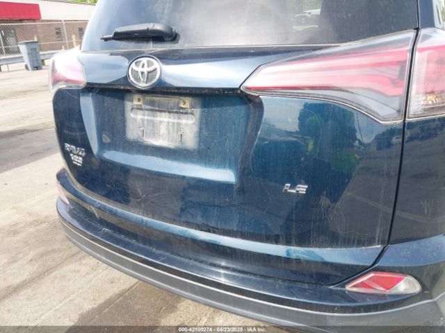 JTMZFREV4JJ208053 Toyota RAV4 LE