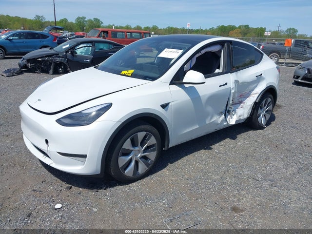 2024 TESLA MODEL Y 7SAYGDEE2RA223679 Photo 1