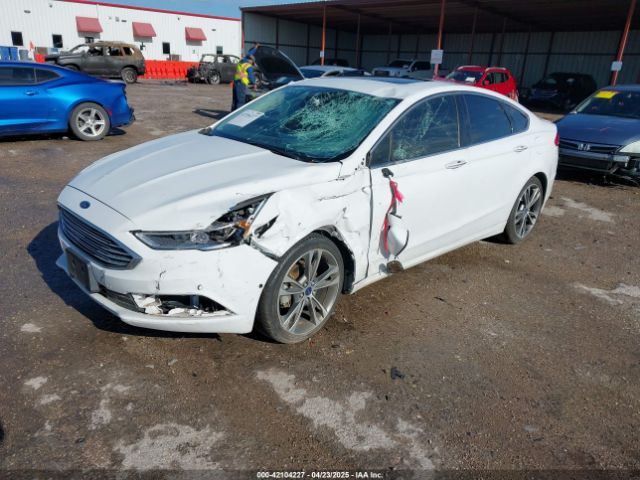 3FA6P0K97HR129498 Ford Fusion Titanium