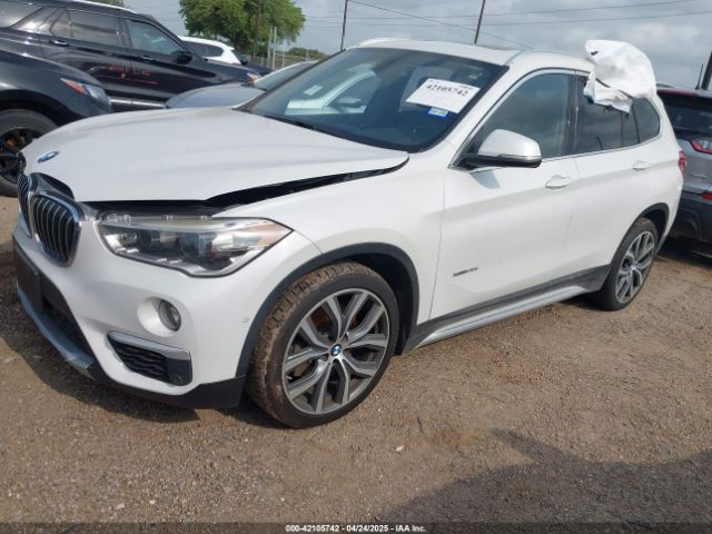 2016 BMW X1 WBXHT3C39GP881934 Photo 1
