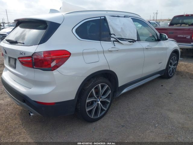 2016 BMW X1 WBXHT3C39GP881934 Photo 3