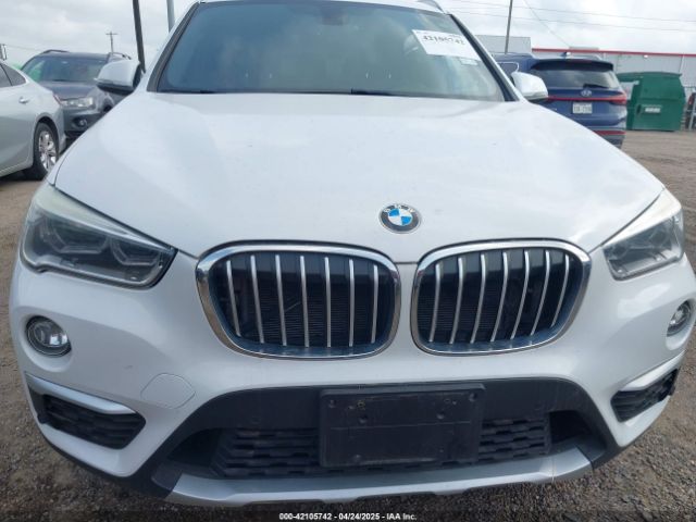 2016 BMW X1 WBXHT3C39GP881934 Photo 5