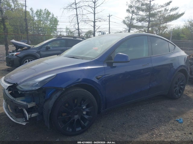 2023 TESLA MODEL Y 7SAYGDEE8PF768589 Photo 1