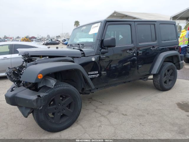 1C4BJWDG5EL222524 Jeep Wrangler Unlimited Sport