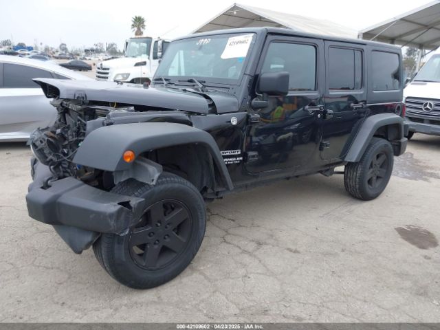 1C4BJWDG5EL222524 Jeep Wrangler Unlimited Sport