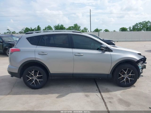 2T3NFREV9JW424156 Toyota RAV4 SE