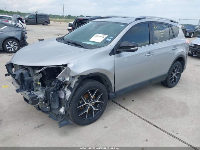 2T3NFREV9JW424156 Toyota RAV4 SE