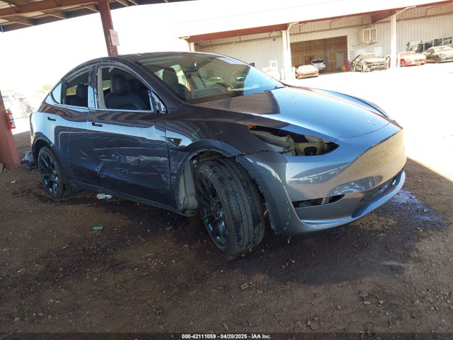 2023 TESLA MODEL Y 7SAYGAEEXPF618174 Photo 0
