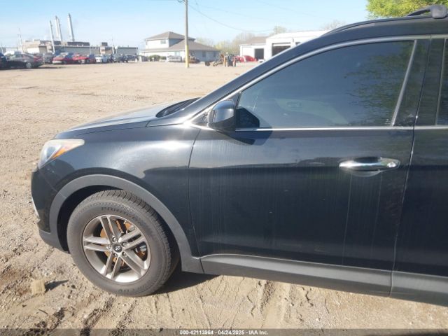 5NMZU3LB2HH037704 Hyundai Santa Fe Sport 2.4l