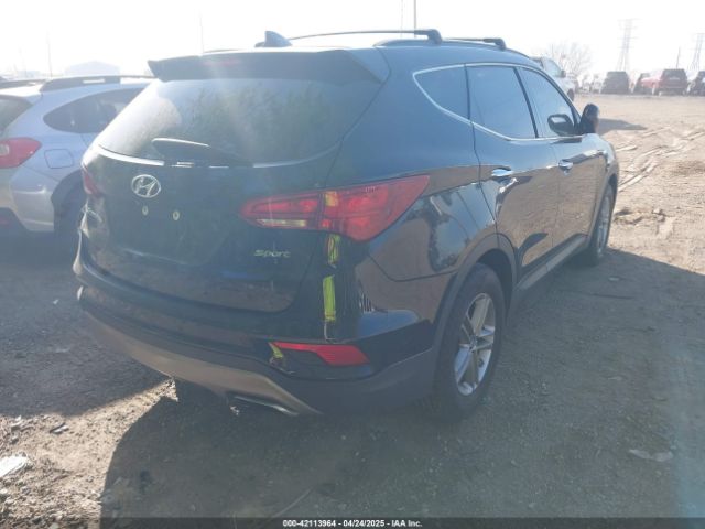 5NMZU3LB2HH037704 Hyundai Santa Fe Sport 2.4l