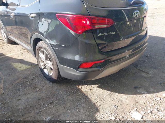 5NMZU3LB2HH037704 Hyundai Santa Fe Sport 2.4l