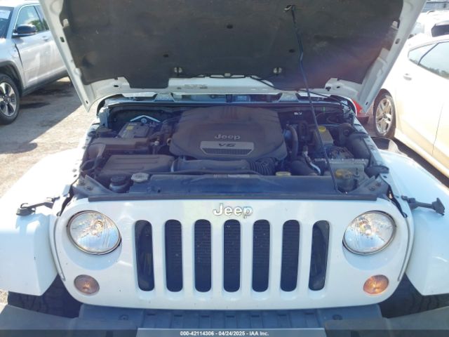 1C4HJWEG5FL582922 Jeep Wrangler Unlimited Sahara