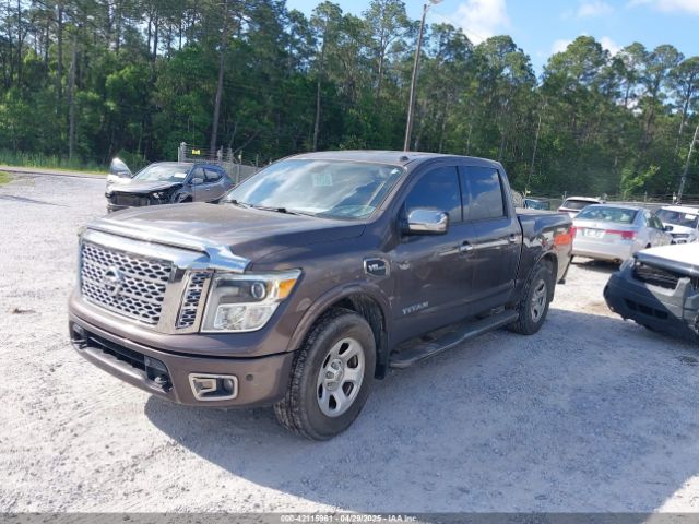 1N6AA1E64HN502493 Nissan Titan Platinum Reserve