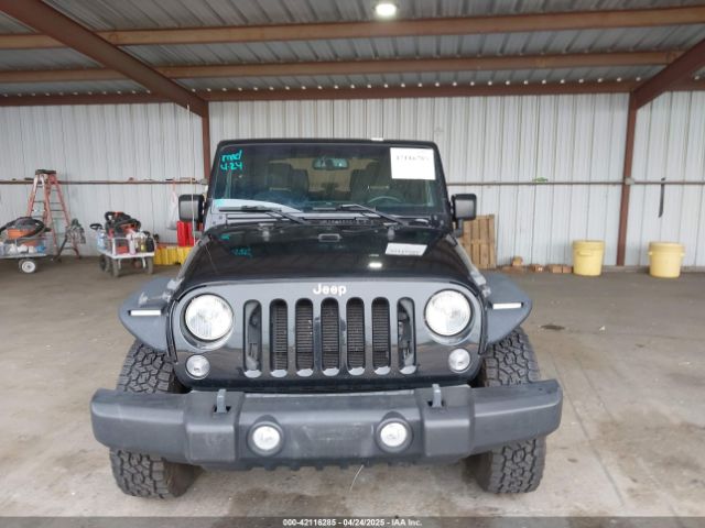 1C4AJWAG8FL550635 Jeep Wrangler Sport