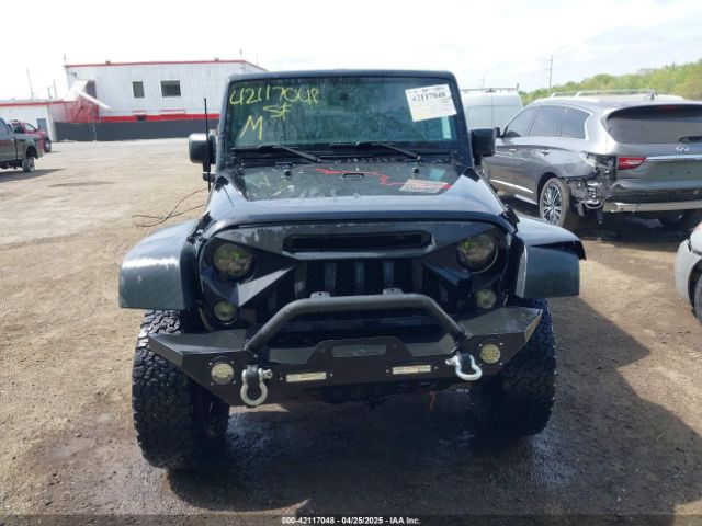 1C4BJWDG6GL191982 Jeep Wrangler Unlimited Black Bear