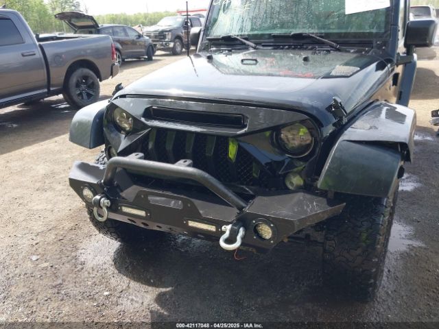 1C4BJWDG6GL191982 Jeep Wrangler Unlimited Black Bear