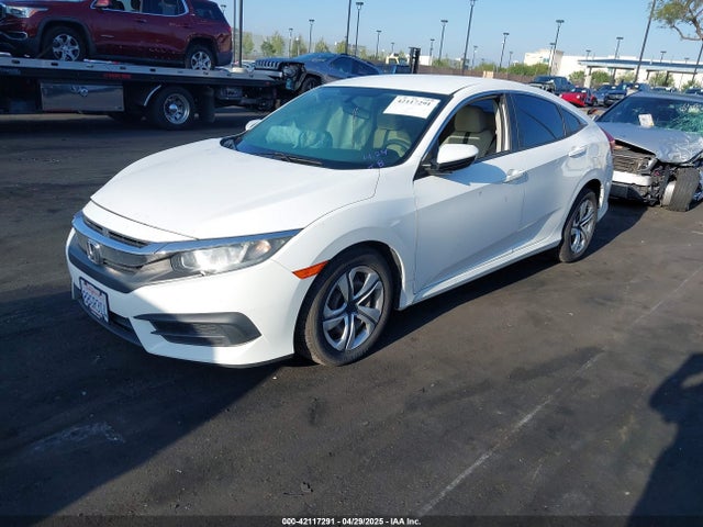 2HGFC2F56JH502770 Honda Civic Lx