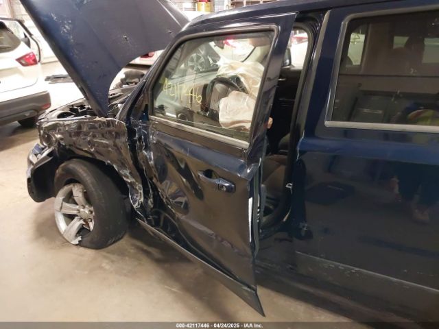 1C4NJRFB2ED693945 Jeep Patriot Latitude