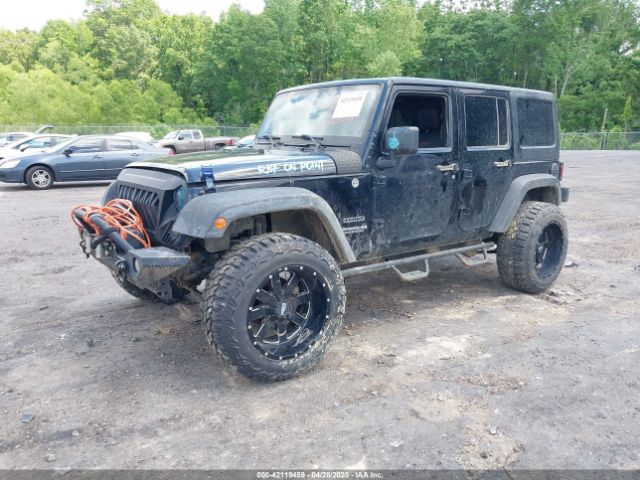1C4BJWDG9FL523458 Jeep Wrangler Unlimited Sport