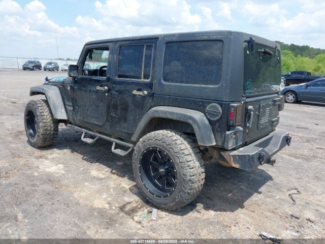 1C4BJWDG9FL523458 Jeep Wrangler Unlimited Sport