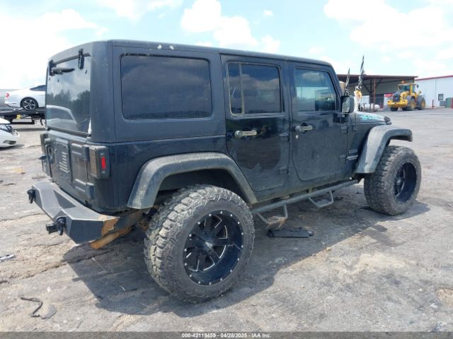 1C4BJWDG9FL523458 Jeep Wrangler Unlimited Sport