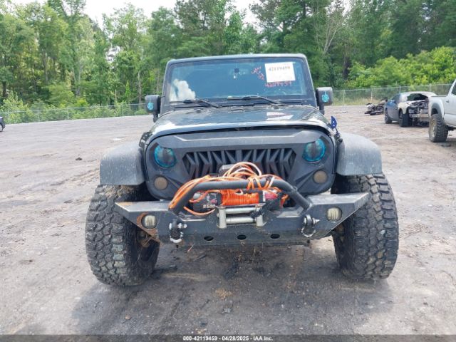 1C4BJWDG9FL523458 Jeep Wrangler Unlimited Sport