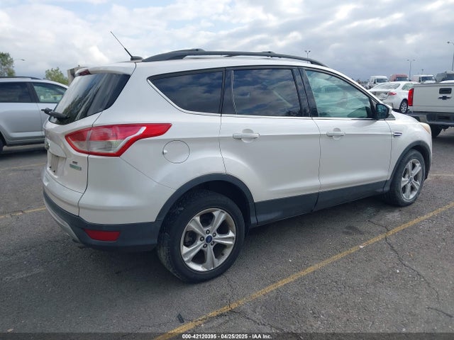 1FMCU0GX0EUB16203 Ford 2014