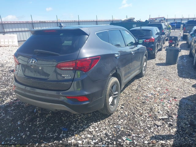 5XYZTDLB4HG499703 Hyundai Santa Fe Sport 2.4l