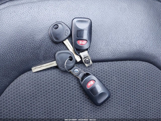 KM8JU3AG1EU806530 Hyundai TUCSON SE