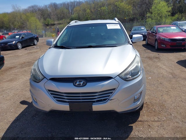 KM8JU3AG1EU806530 Hyundai TUCSON SE