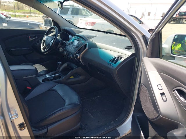 KM8JU3AG1EU806530 Hyundai TUCSON SE