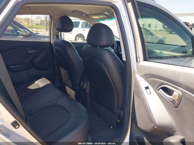 KM8JU3AG1EU806530 Hyundai TUCSON SE
