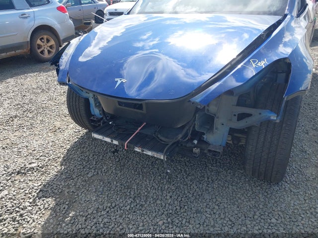 2024 TESLA MODEL Y 7SAYGAEE7RF991627 Photo 5