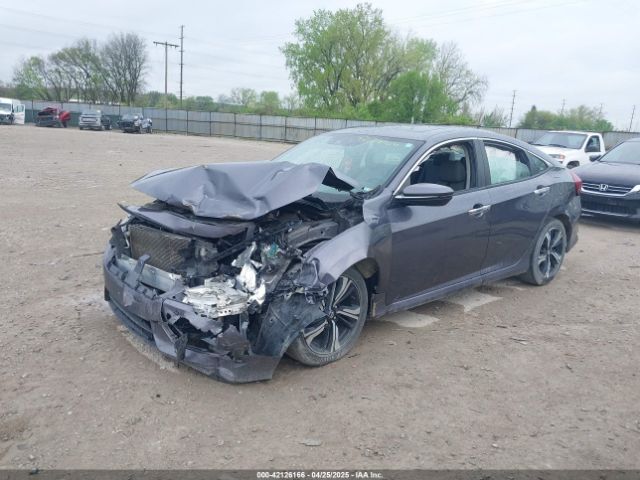 19XFC1F9XGE043906 Honda Civic Touring