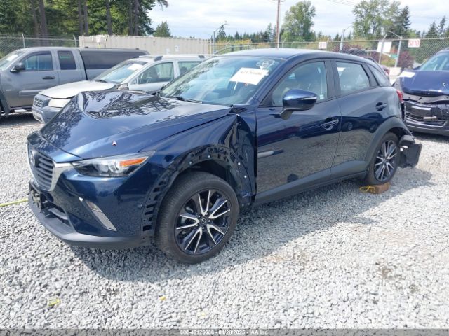 JM1DKFC7XJ0332410 Mazda Cx-3 Touring