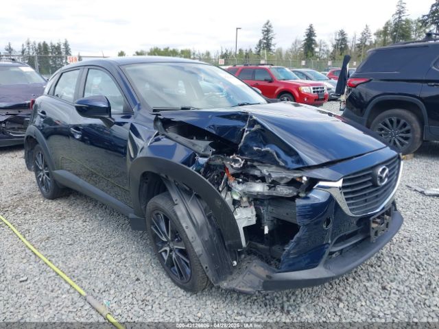 JM1DKFC7XJ0332410 Mazda Cx-3 Touring