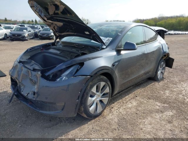 2023 TESLA MODEL Y 7SAYGDEE5PA200040 Photo 1