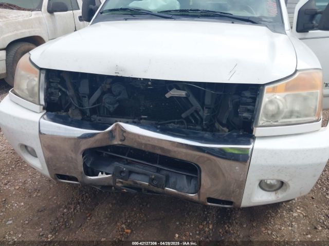 1N6BA0ED1EN511595 Nissan TITAN SV