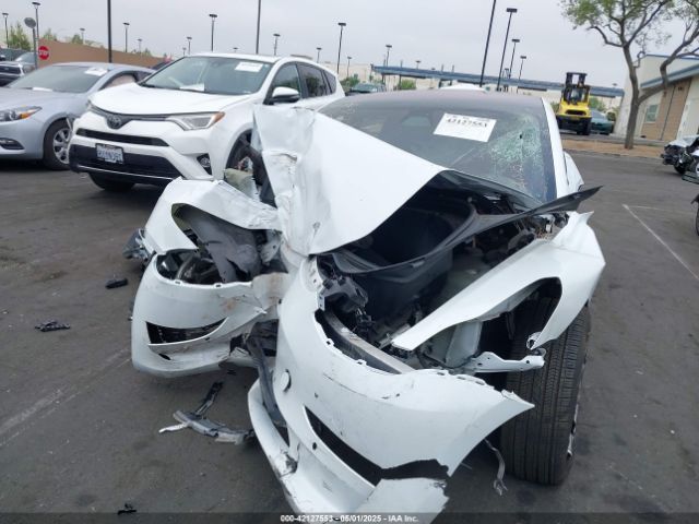 5YJ3E1EA4JF076099 Tesla Model 3 Long Range/mid Range