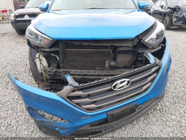 KM8J3CA24GU037886 Hyundai Tucson Sport