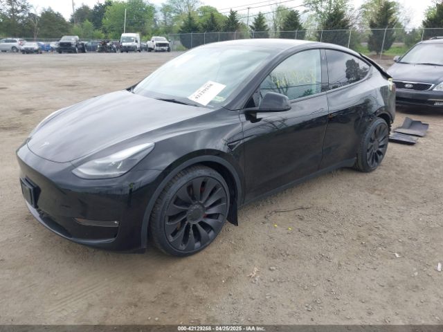 2023 TESLA MODEL Y 7SAYGDEF7PF663387 Photo 1